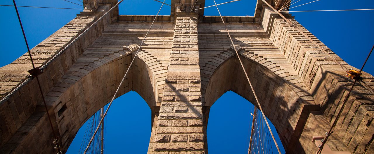 Upward view of the Brooklyn Bridge, NYC
